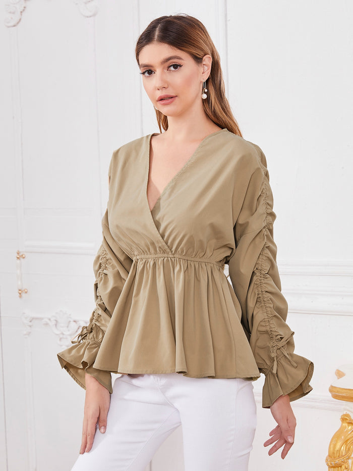 Surplice Neck Ruched Knot Sleeve Peplum Top